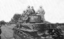 На снимке хорошо видна эмблема 18-ой танковой дивизии Вермахта и полковой знак 18-ого танкового полка нанесённые на   башне танка PzKpfw IV.  Западный фронт, сентябрь 1941 г. 
